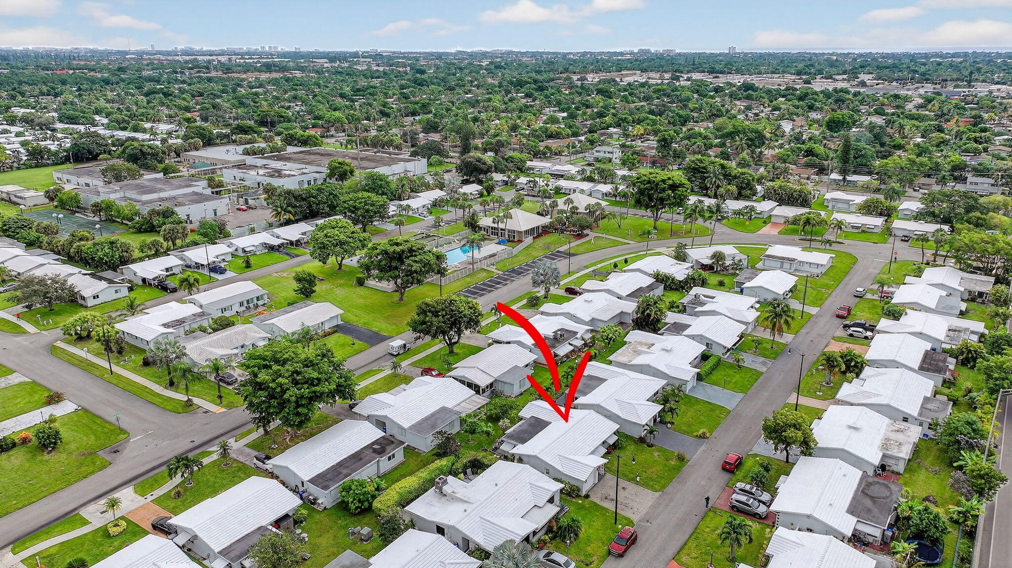161 Northwest 24th Court Pompano Beach, FL 33064 - Photo 30 of 45 an aerial view of residential houses with outdoor space and trees