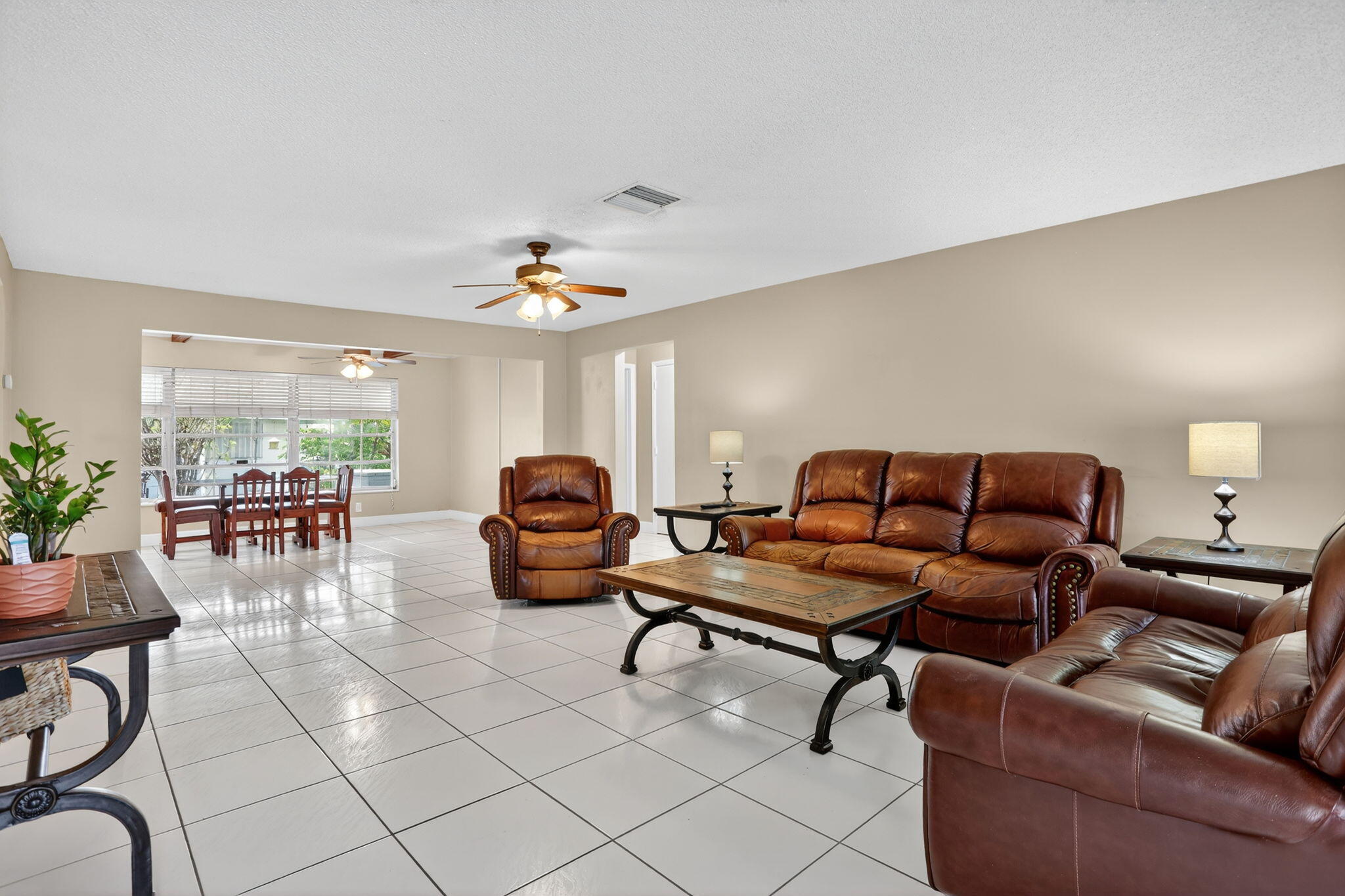 161 Northwest 24th Court Pompano Beach, FL 33064 - Photo 3 of 45 a living room with furniture and wooden floor