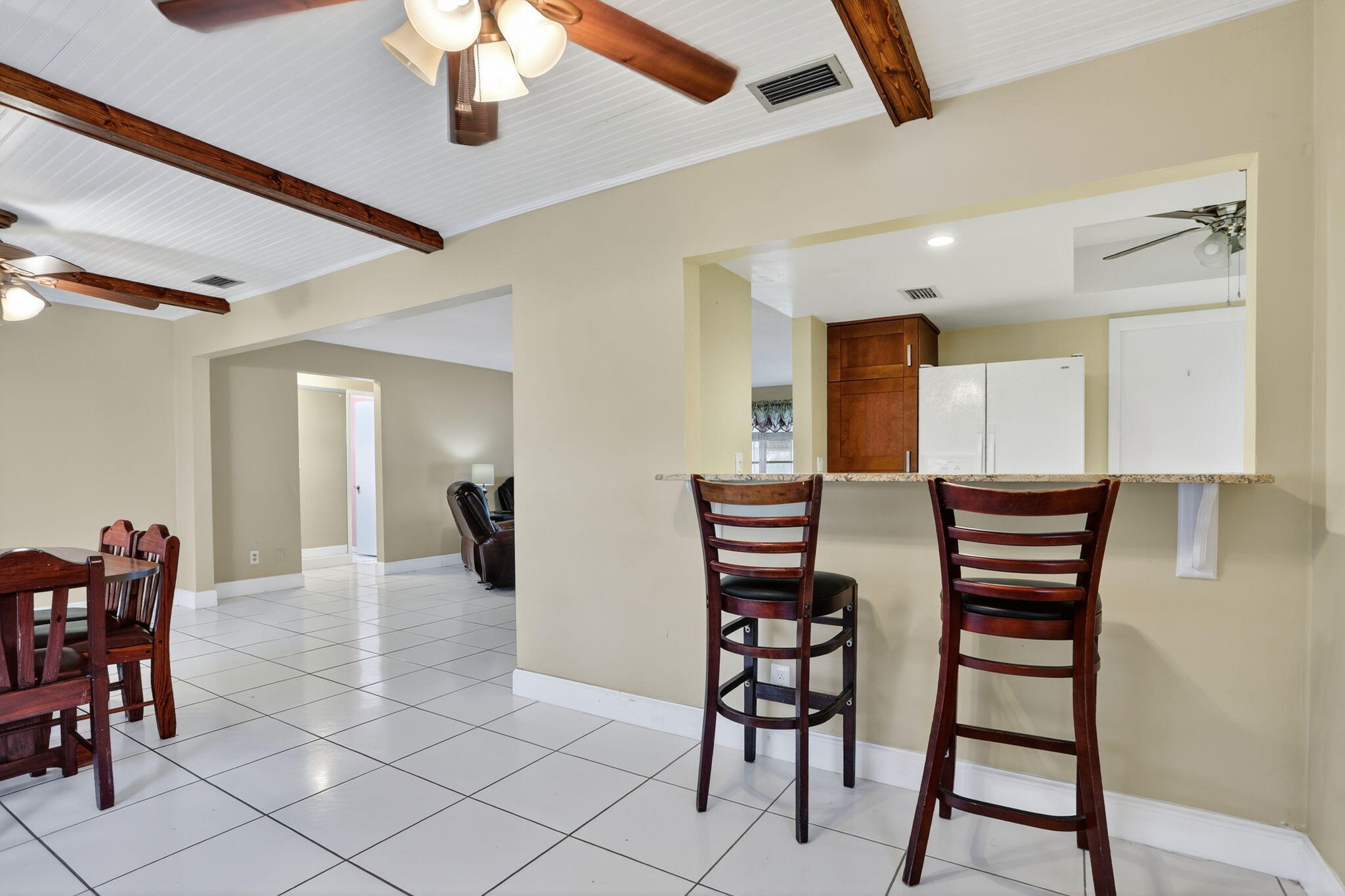 161 Northwest 24th Court Pompano Beach, FL 33064 - Photo 9 of 45 a dining room with furniture and window