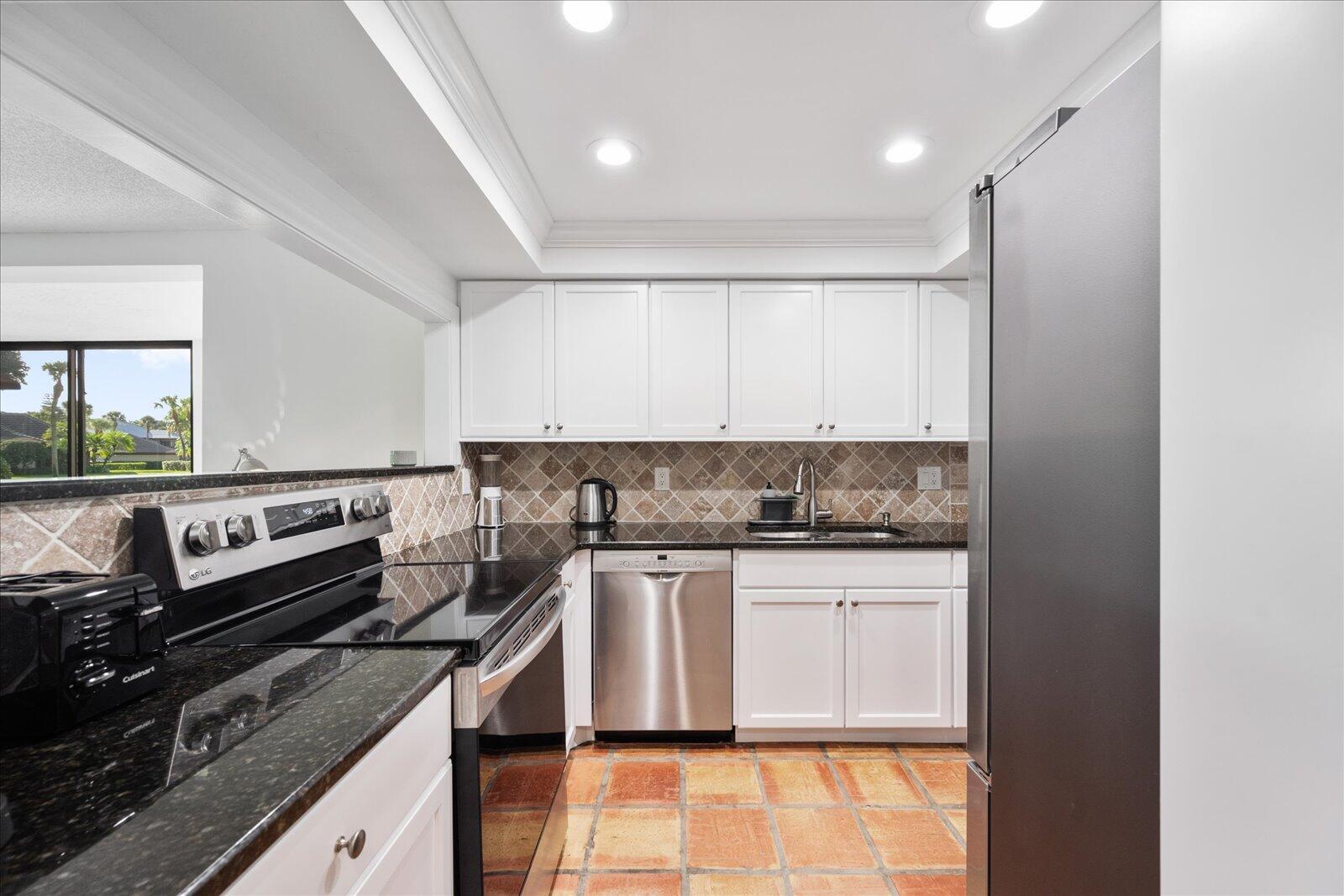 13307 Polo Club Road, Unit C106 Wellington, FL 33414 - Photo 10 of 25 Kitchen