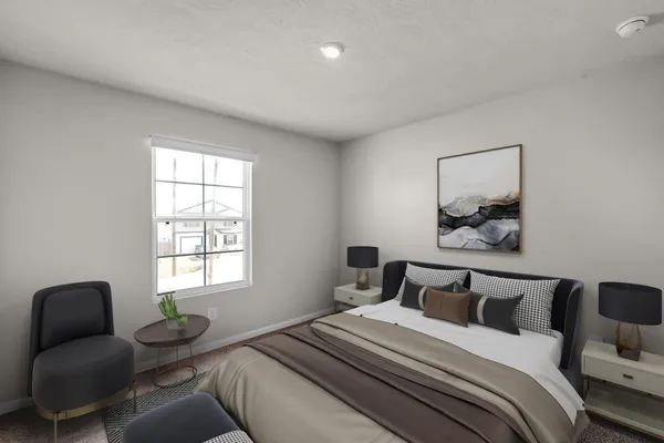 a bedroom with bed couch and window