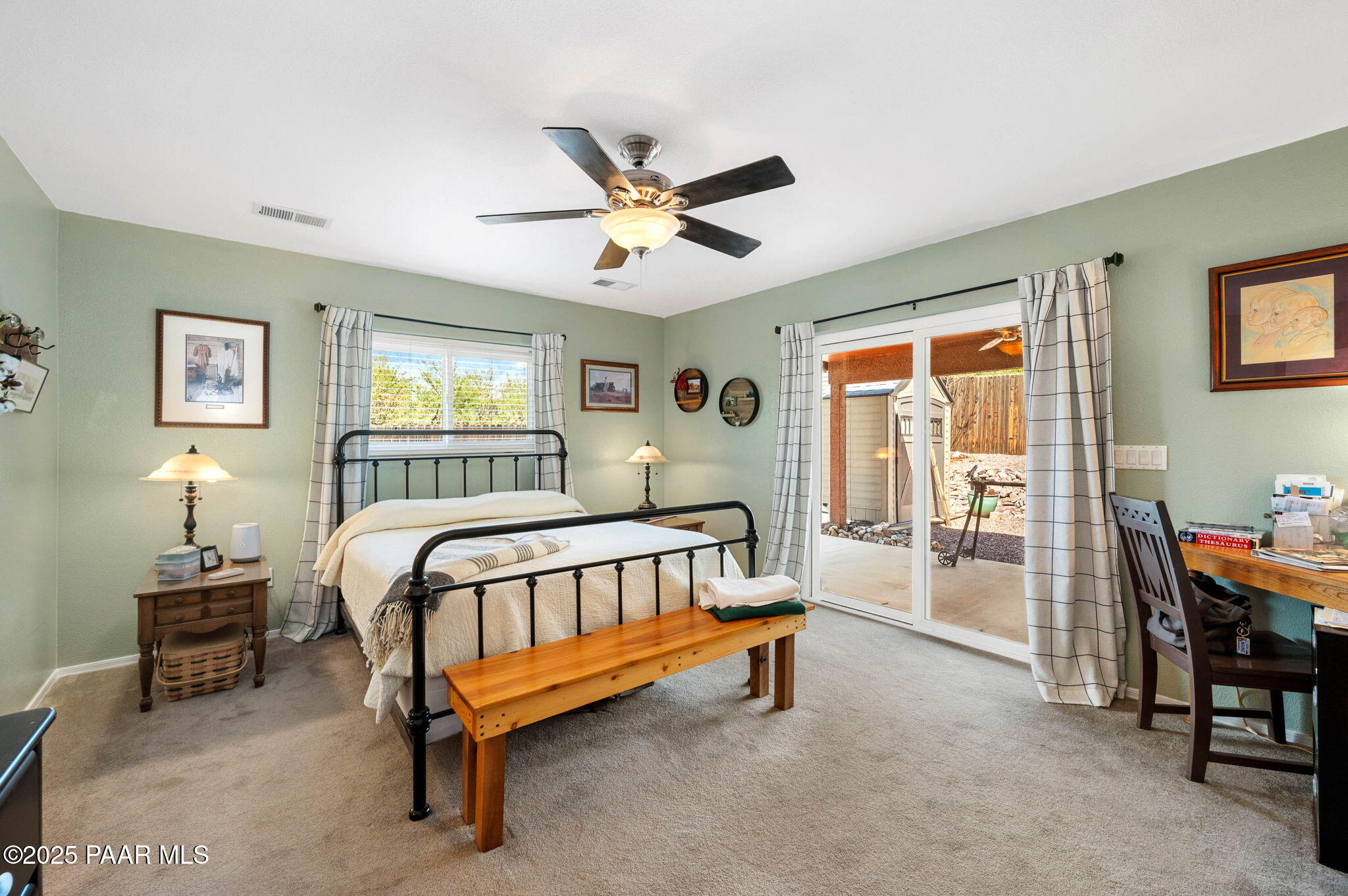 17798 East Trails End Road Mayer, AZ 86333 - Photo 13 of 30 a bedroom with a bed and a chandelier