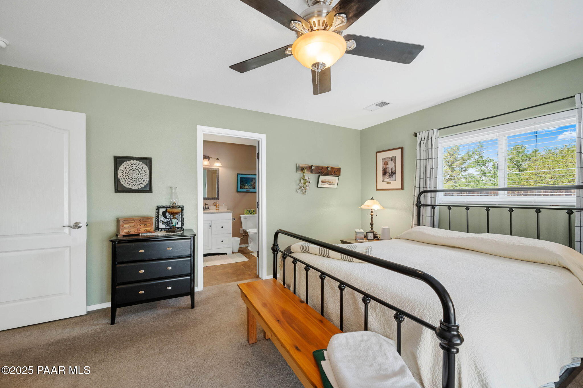 17798 East Trails End Road Mayer, AZ 86333 - Photo 14 of 30 a bedroom with a bed and a chandelier