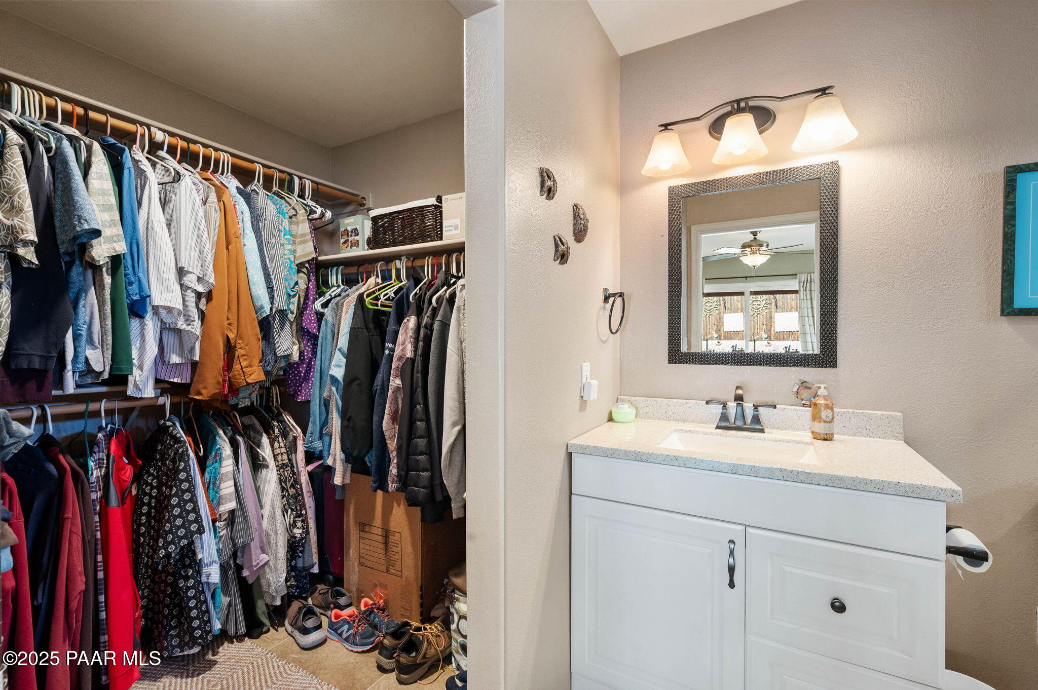 17798 East Trails End Road Mayer, AZ 86333 - Photo 16 of 30 a view of walk in closet with clothes