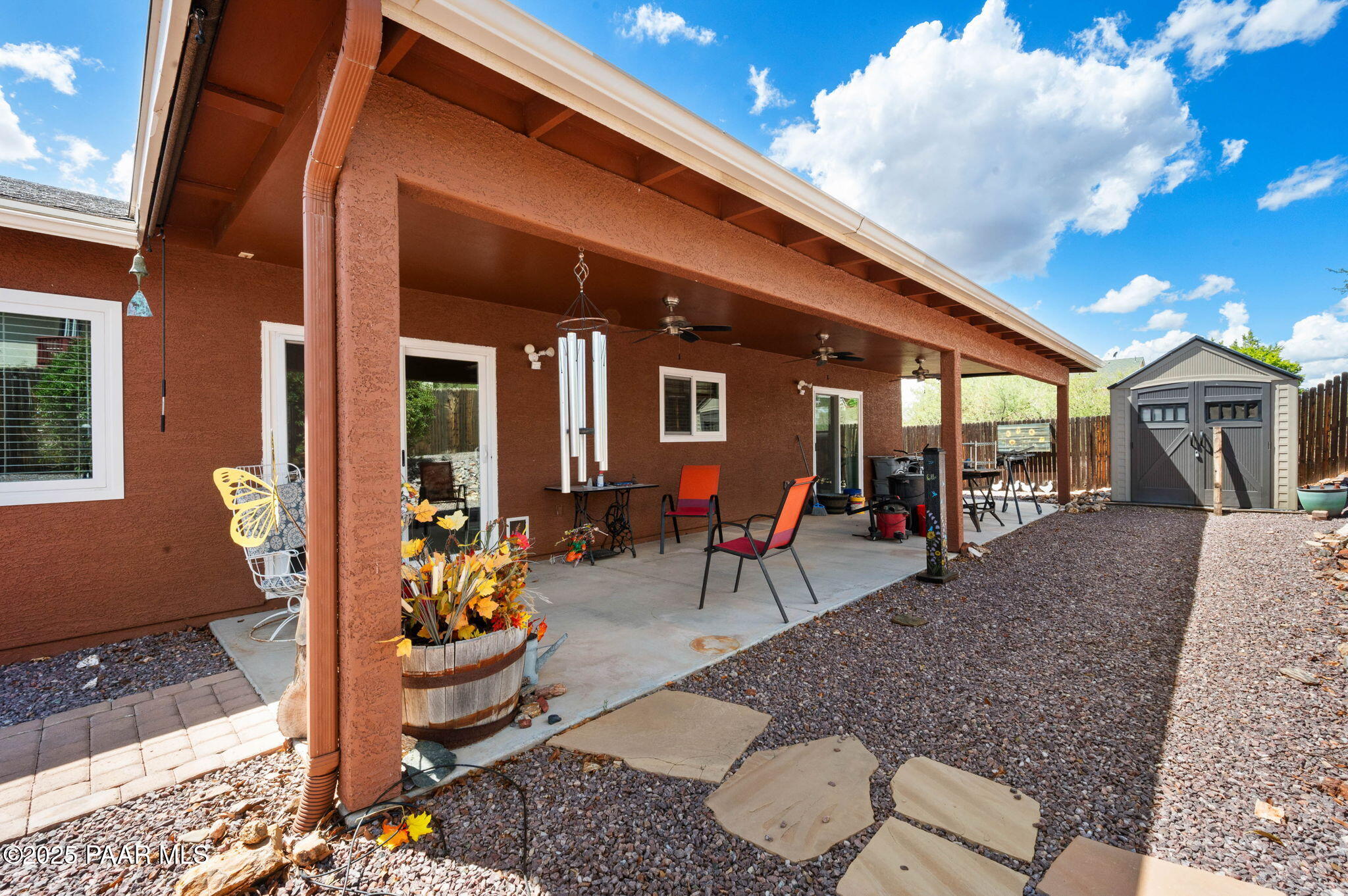 17798 East Trails End Road Mayer, AZ 86333 - Photo 21 of 30 a building outdoor space with patio furniture and potted plants