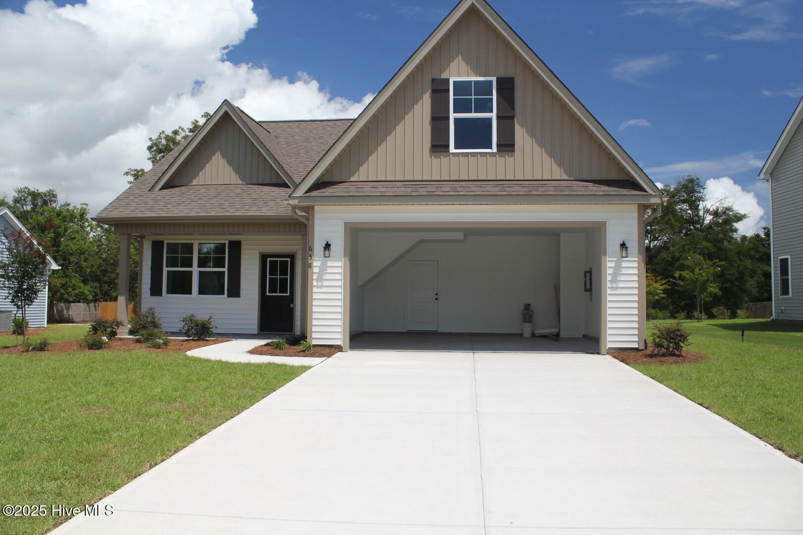 658 Sanctuary Point Southwest Supply, NC 28462 - Photo 2 of 82 658 front 1