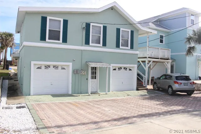 a view of a car park front of a building