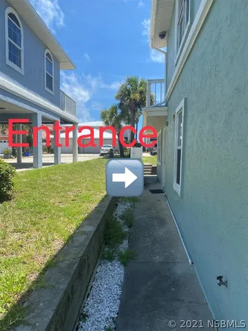 a front view of building with an outdoor space