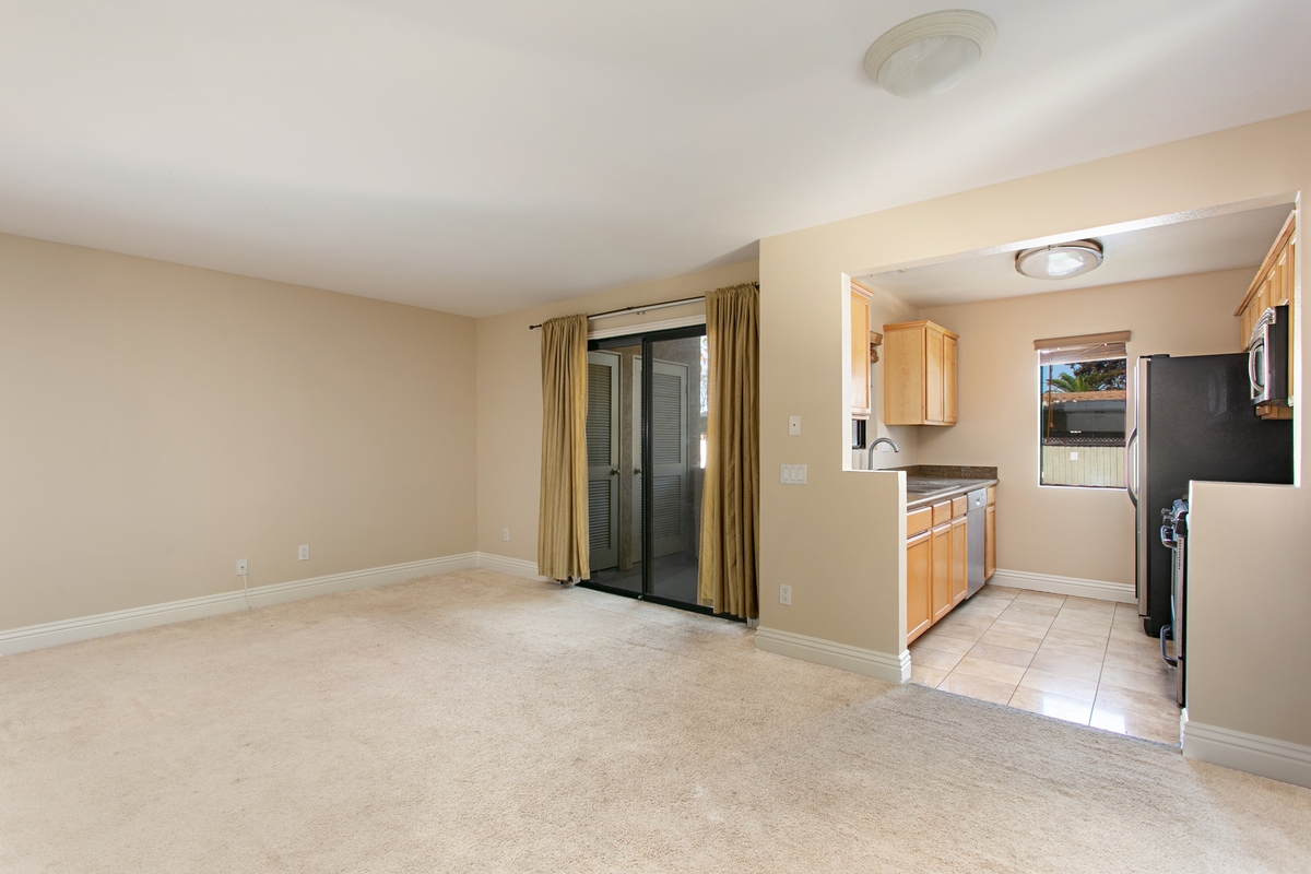 8215 Jade Coast Road, Unit 82 San Diego, CA 92126 - Photo 5 of 15 View from entrance area to balcony and kitchen area
