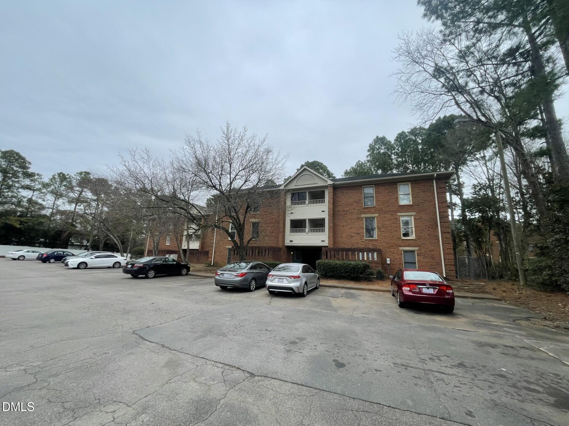 a view of car parked in front of house