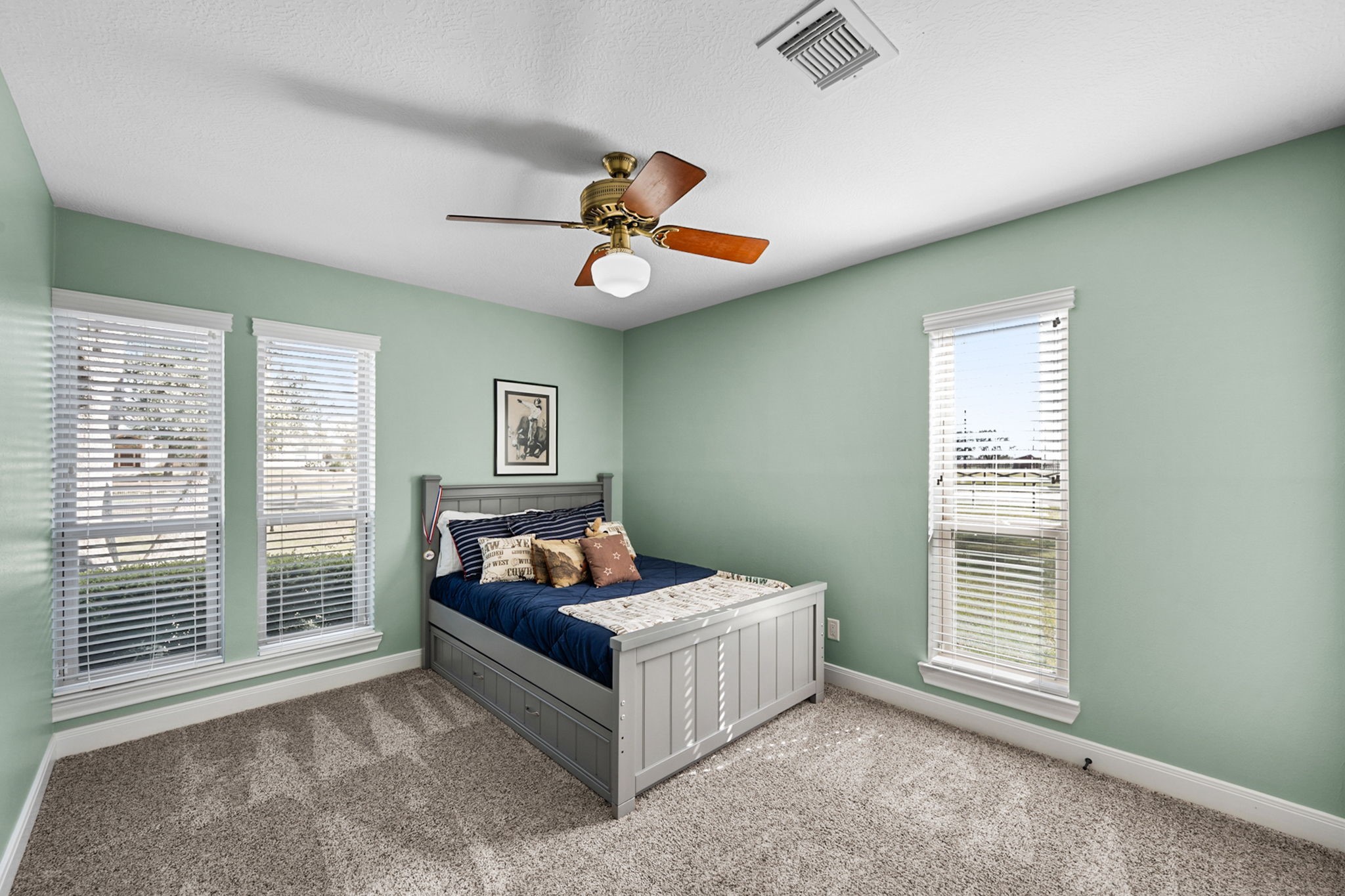 26253 Sharp Road Katy, TX 77493 - Photo 14 of 25 This comfortable secondary bedroom offers a bright and inviting space, featuring beautiful large windows.
