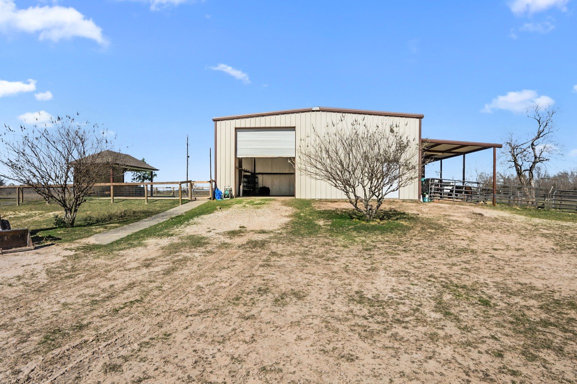 26253 Sharp Road Katy, TX 77493 - Photo 21 of 26 The property includes a 40' x 40' barn that provides ample space for equipment storage or agricultural use, offering flexible options to fit your needs.