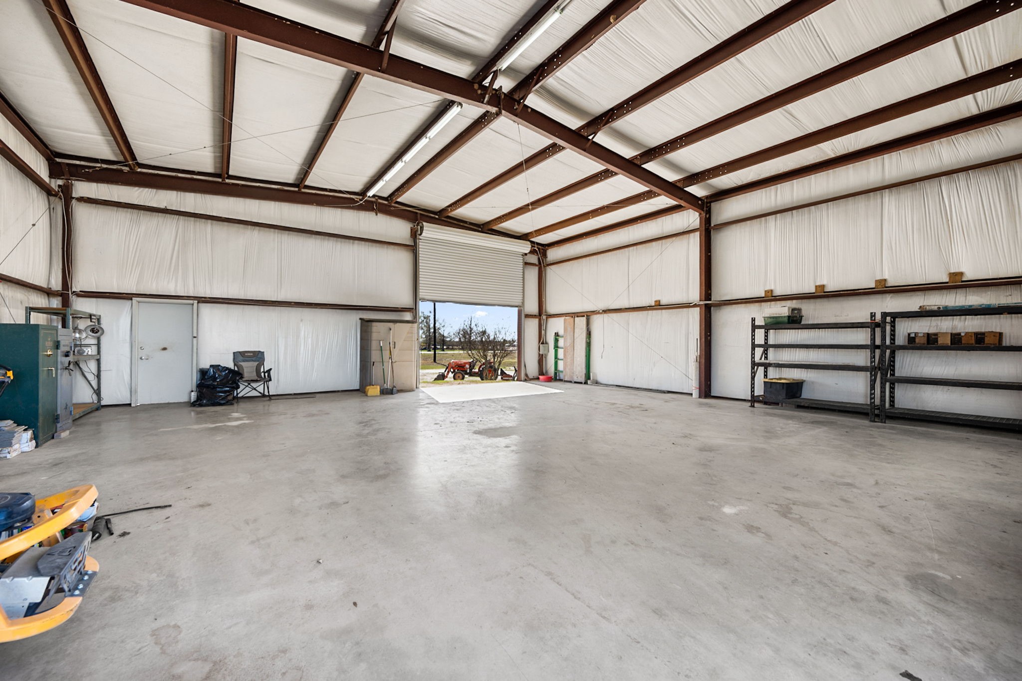 26253 Sharp Road Katy, TX 77493 - Photo 23 of 25 Inside the barn, you’ll find a versatile layout that can accommodate tools, vehicles, livestock supplies, or hobby projects with room to spare.
