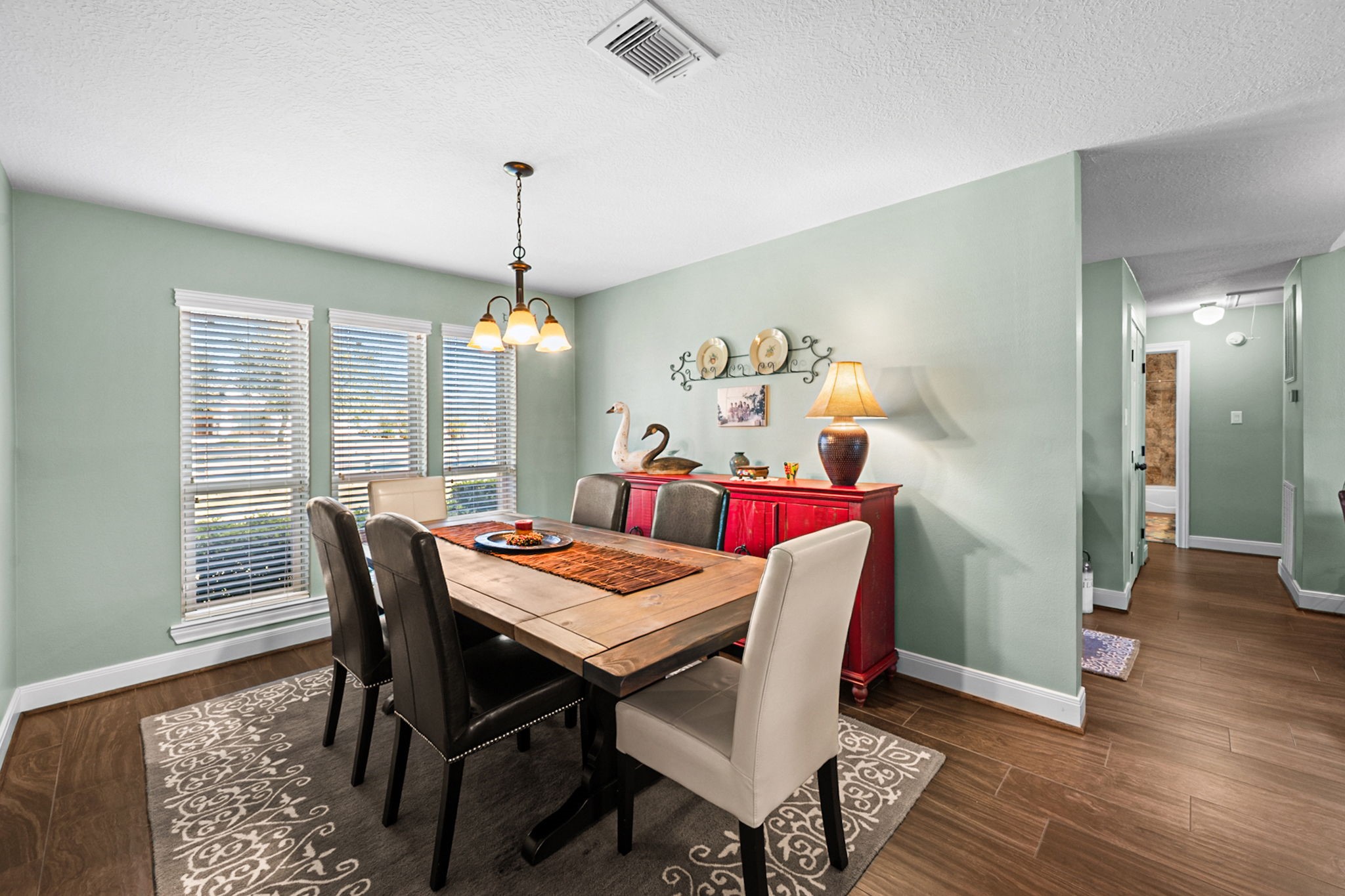 26253 Sharp Road Katy, TX 77493 - Photo 9 of 25 The formal dining room, located just off the entry, features high ceilings and large windows that create a welcoming atmosphere for gatherings.