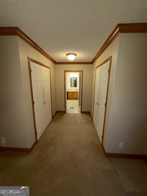 163 Dellwood Road Swainsboro, GA 30401 - Photo 13 of 23 a view of a hallway to rooms