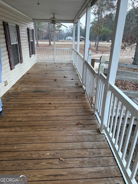 163 Dellwood Road Swainsboro, GA 30401 - Photo 6 of 23 a view of wooden floor and stairs