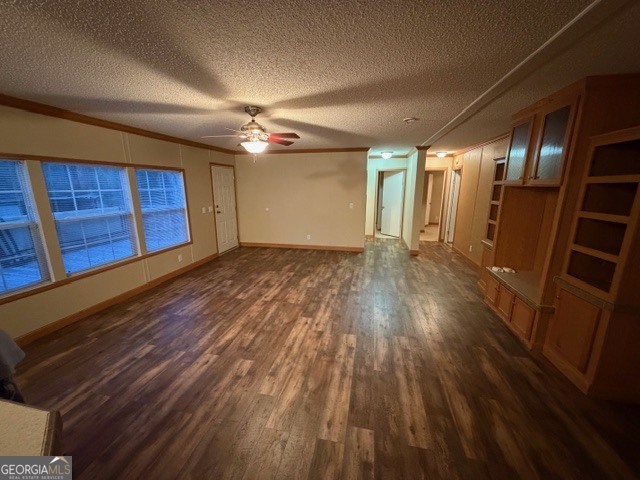 163 Dellwood Road Swainsboro, GA 30401 - Photo 7 of 23 a view of an empty room with wooden floor and a window