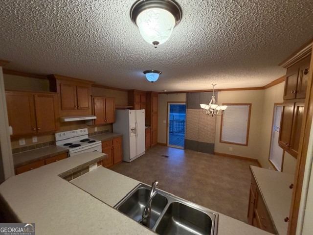 163 Dellwood Road Swainsboro, GA 30401 - Photo 9 of 23 a kitchen with refrigerator and window