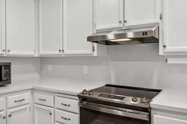 a view of a livingroom with wooden floor