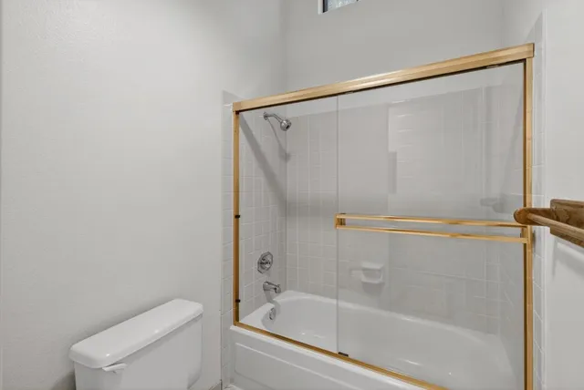 a view of a house with a yard and garage