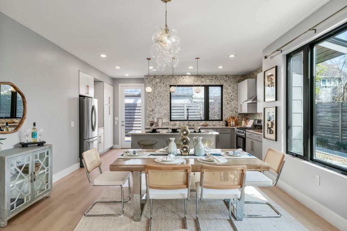 3612 Thompson Street, Unit 1 Austin, TX 78702 - Photo 14 of 40 The dining space sits right in the flow of the home, ready for dinner parties, game nights, and slow Sundays.