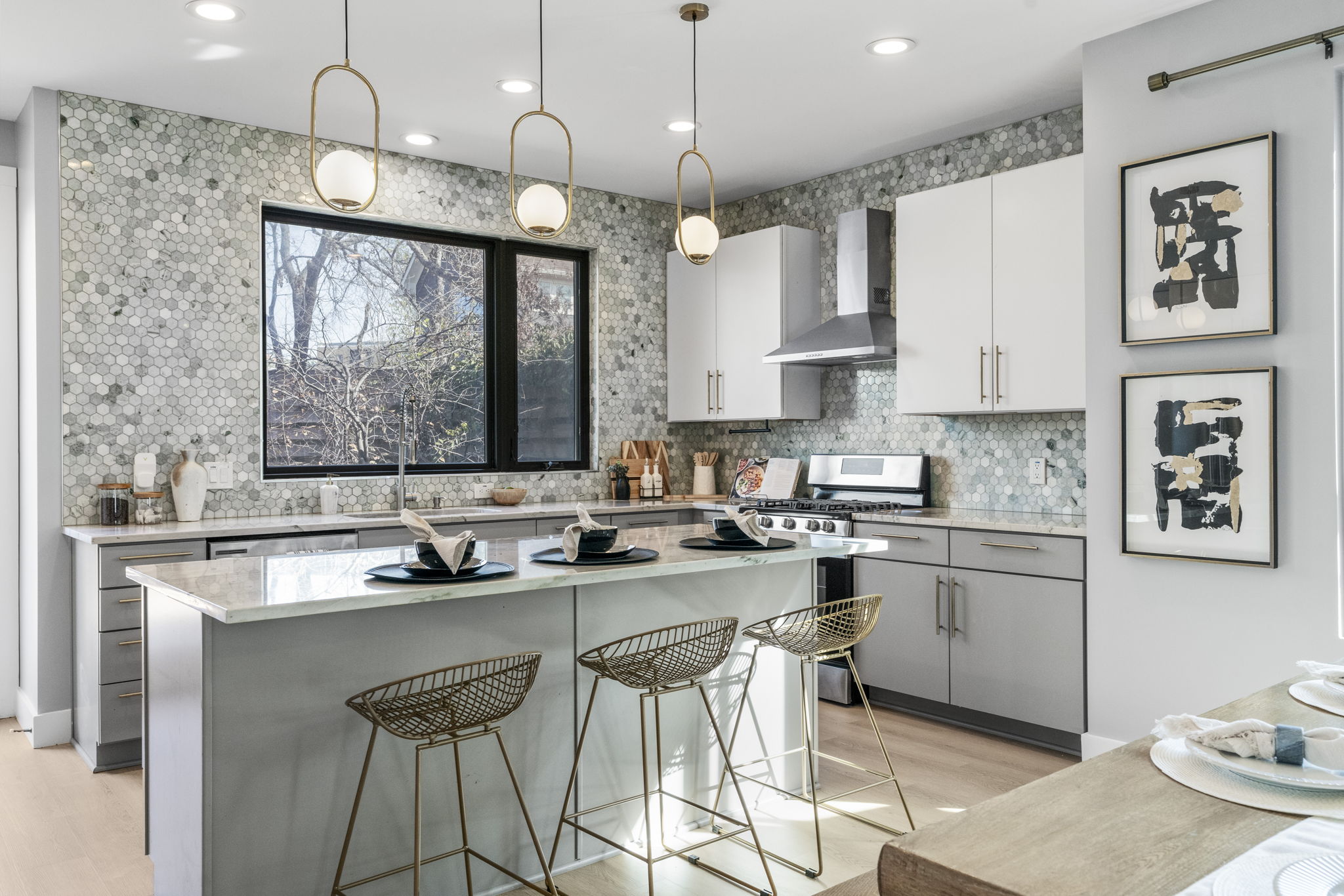 3612 Thompson Street, Unit 1 Austin, TX 78702 - Photo 15 of 40 Textured tile, modern hardware, and clean lines deliver a kitchen that feels custom and current.