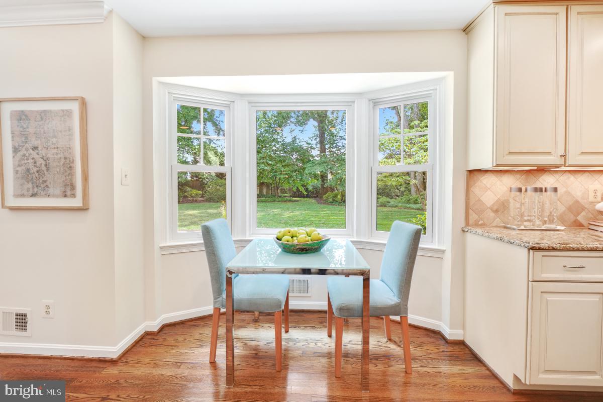 11321 Marcliff Road North Bethesda, MD 20852 - Photo 13 of 48 a view of a dining room with furniture window and wooden floor