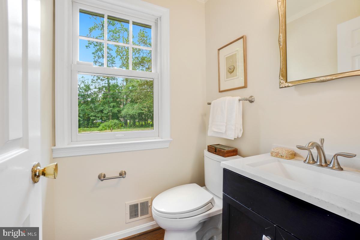 11321 Marcliff Road North Bethesda, MD 20852 - Photo 17 of 48 a bathroom with a sink a toilet and a window