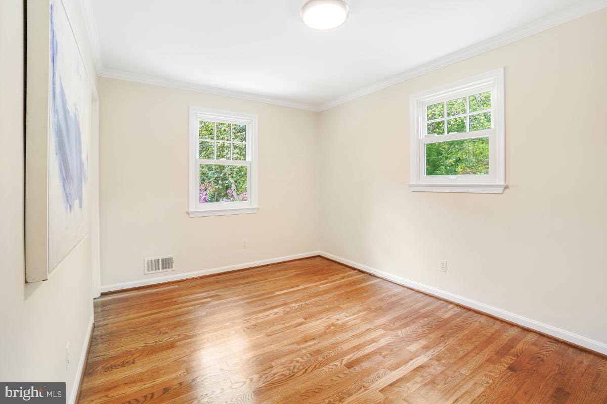 11321 Marcliff Road North Bethesda, MD 20852 - Photo 25 of 48 wooden floor in an empty room with a window
