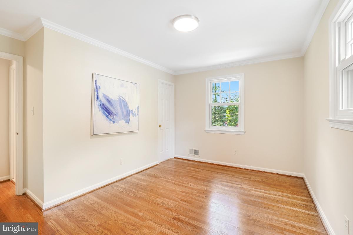 11321 Marcliff Road North Bethesda, MD 20852 - Photo 26 of 48 wooden floor in an empty room with a window