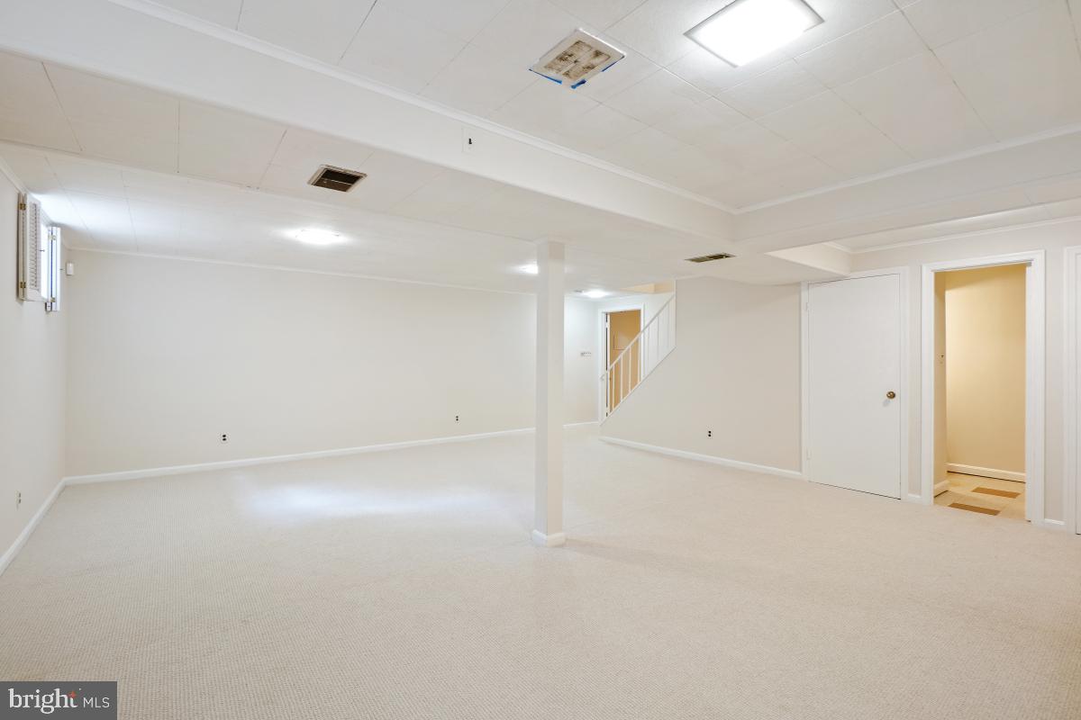 11321 Marcliff Road North Bethesda, MD 20852 - Photo 33 of 48 an empty room with a empty space and windows