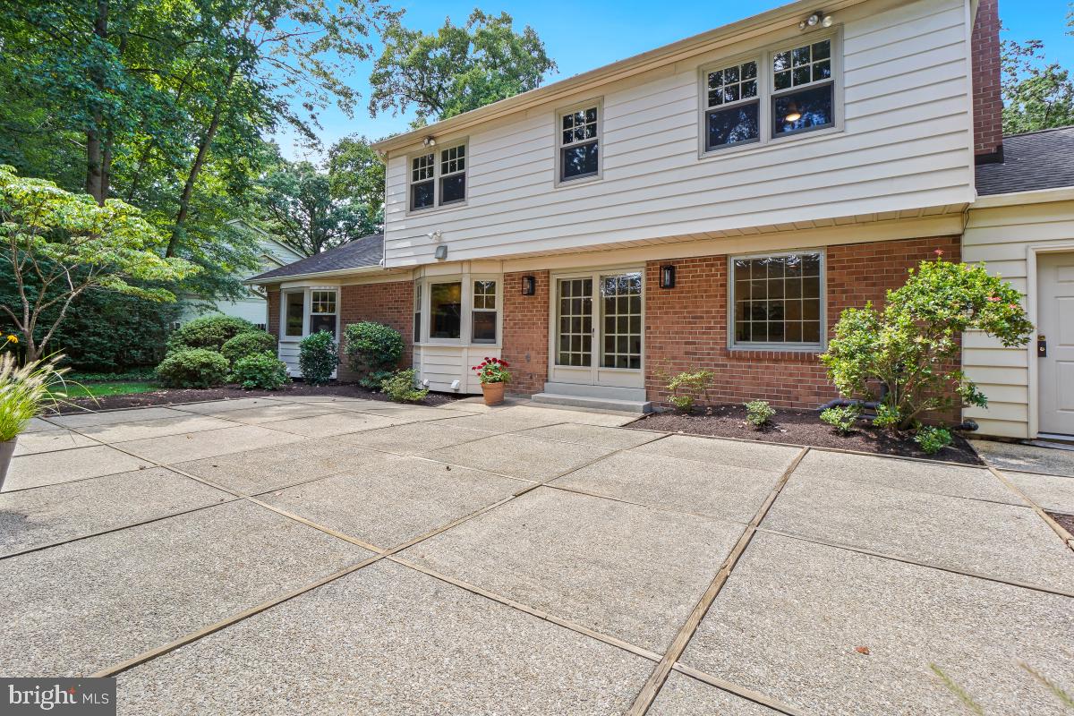 11321 Marcliff Road North Bethesda, MD 20852 - Photo 42 of 48 a front view of a house with garden