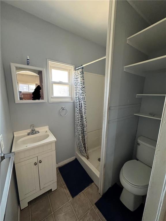 110 13th Street Conway, PA 15027 - Photo 6 of 6 a bathroom with a toilet sink and shower