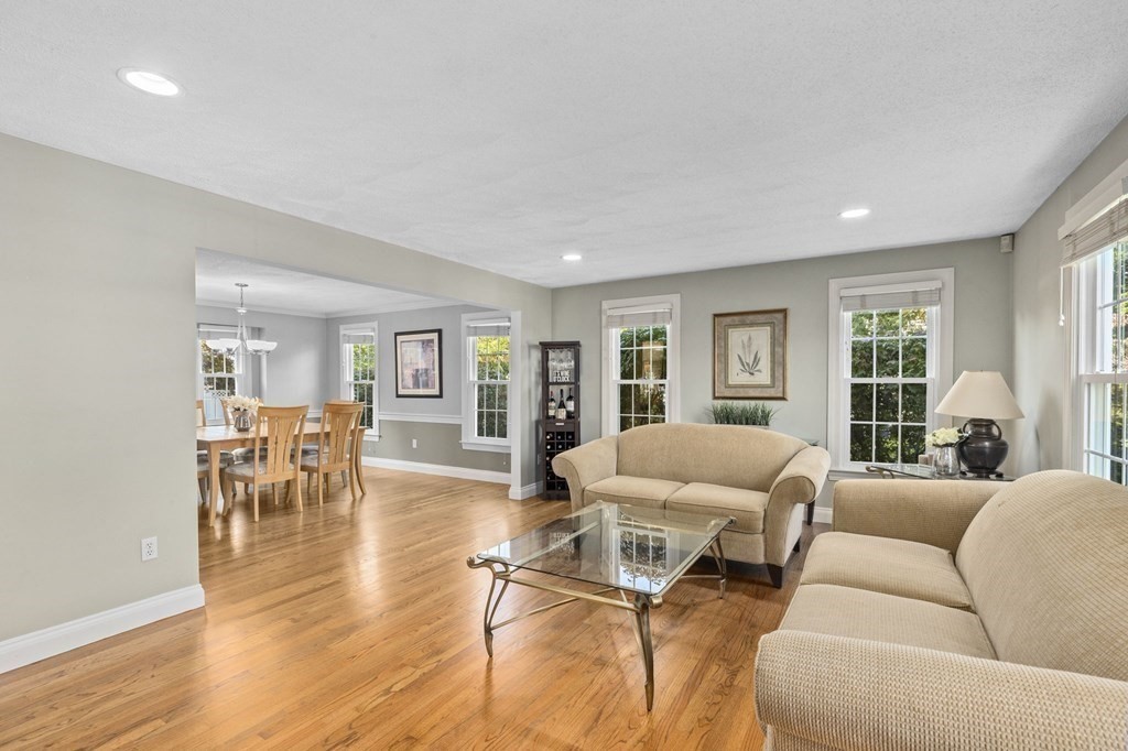 35 Chapelgate Road Canton, MA 02021 - Photo 12 of 41 a living room with furniture and a table