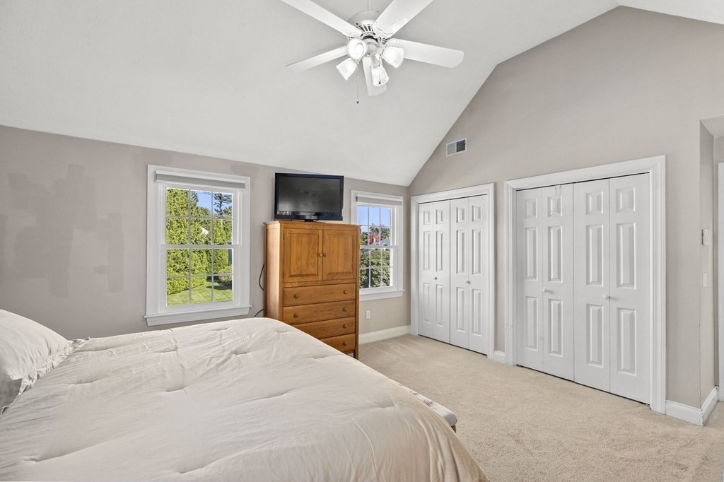 35 Chapelgate Road Canton, MA 02021 - Photo 17 of 41 a bedroom with a bed dresser and a window