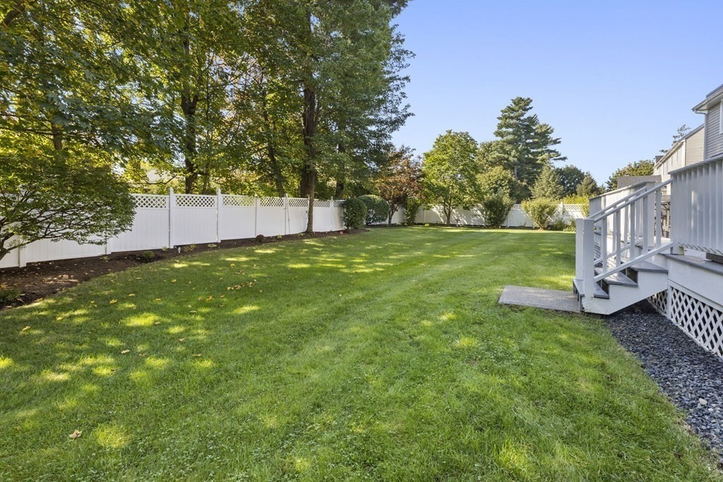 35 Chapelgate Road Canton, MA 02021 - Photo 33 of 41 a view of a garden with trees