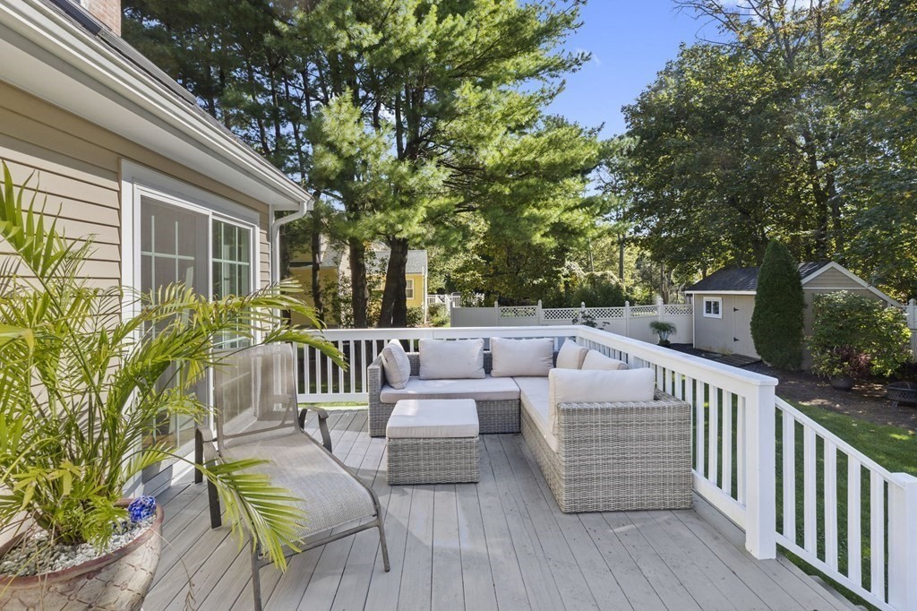 35 Chapelgate Road Canton, MA 02021 - Photo 34 of 41 a view of a patio with couches table and chairs and potted plants