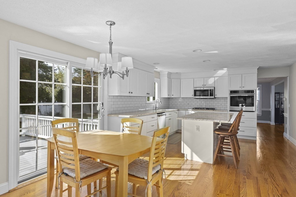35 Chapelgate Road Canton, MA 02021 - Photo 5 of 41 a view of a dining room with furniture window and wooden floor
