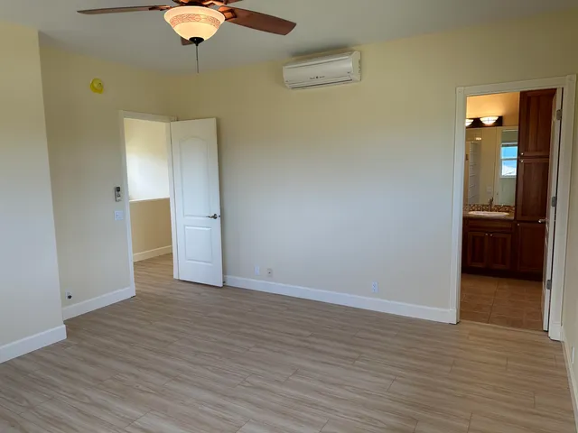 a view of a livingroom with wooden floor