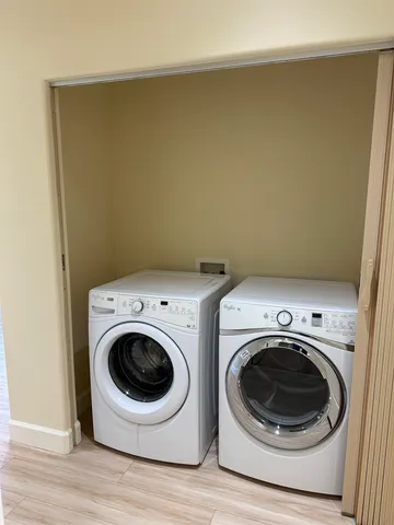 a utility room with dryer and washer