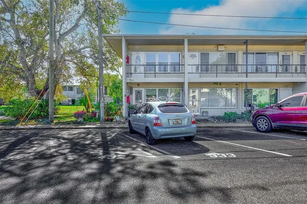 a car parked in front of a building