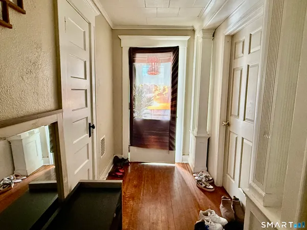 a kitchen with stainless steel appliances kitchen island granite countertop a sink and cabinets