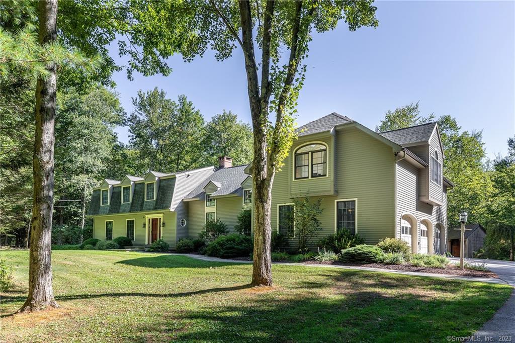 232 Goodhouse Road Litchfield, CT 06759 - Photo 1 of 1 a front view of a house with a yard