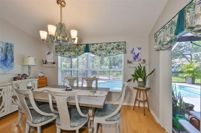 a living room with furniture rug and lamp