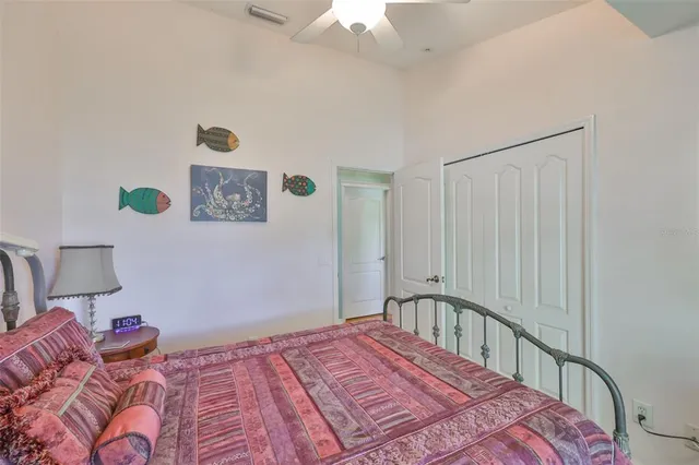 a view of a house with a backyard and a patio