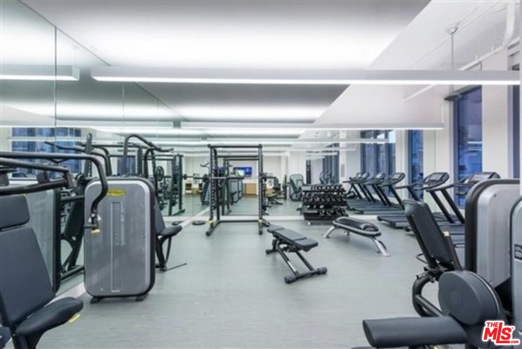 3033 Wilshire Boulevard, Unit 1113 Los Angeles, CA 90020 - Photo 22 of 31 a view of a room with gym equipment
