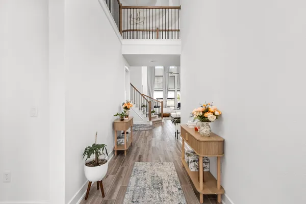 a living room with furniture and a table