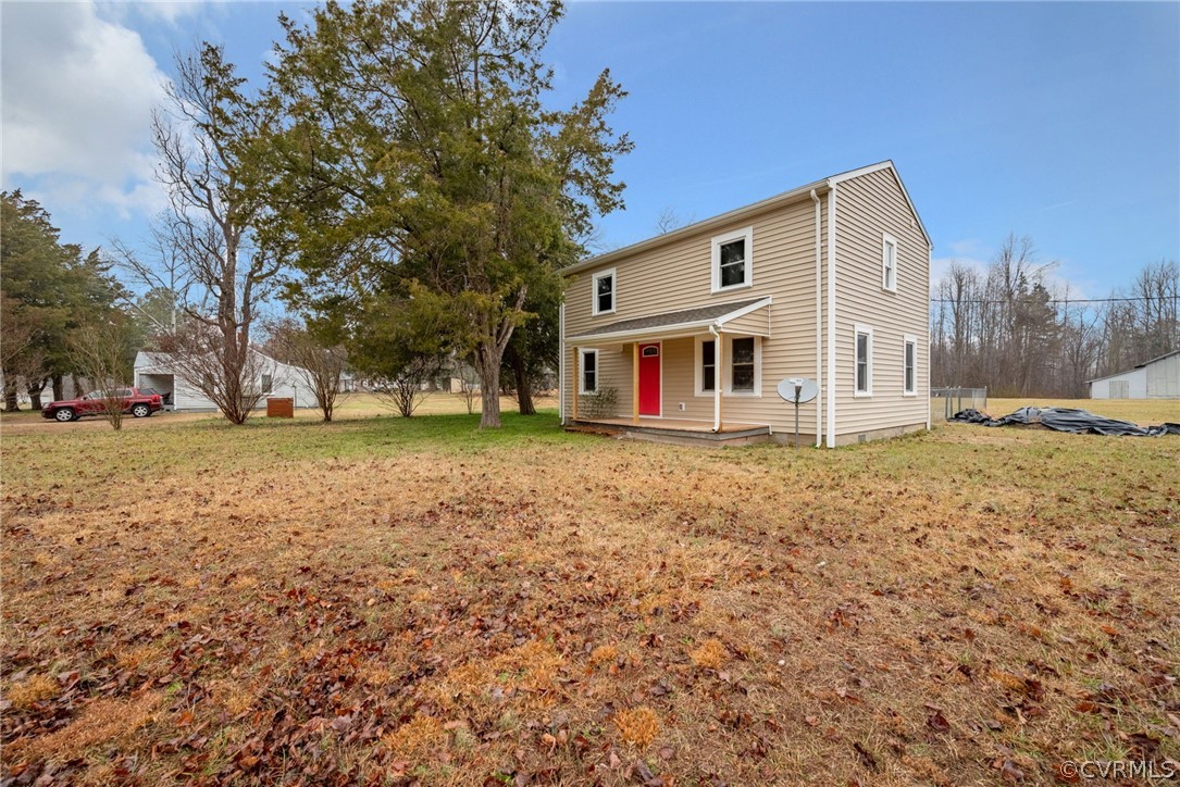 916 Nutbush Road Victoria, VA 23974 - Photo 4 of 25 a front view of a house with a yard