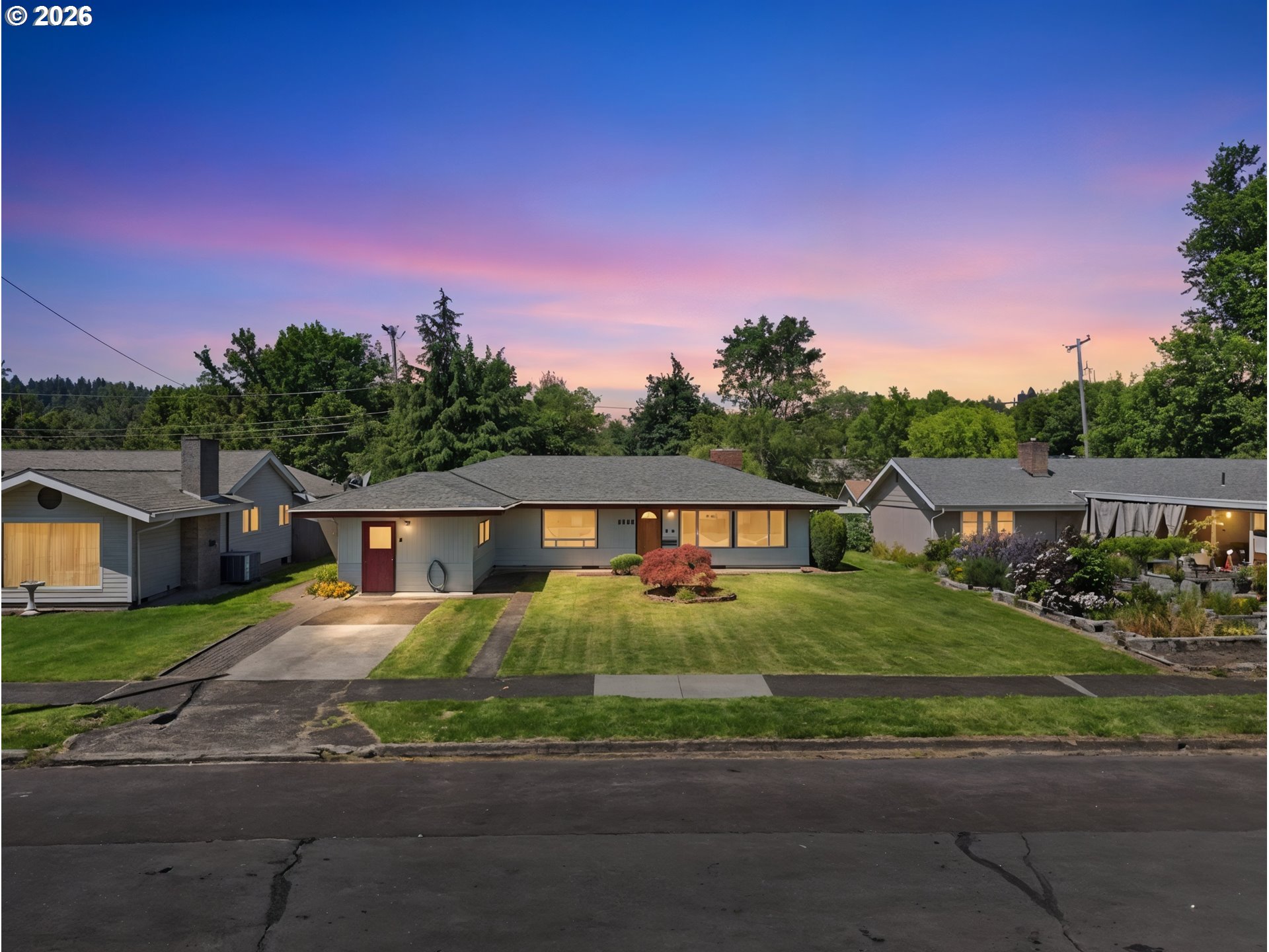 2840 Ferry Street Eugene, OR 97405 - Photo 2 of 35 a front view of a house with a garden