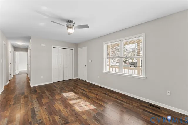 a view of an empty room and window